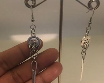 Coralinee button earrings with sewing needle
