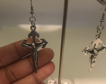 Nancy D. Pointed crucifix earrings, Unisexual
