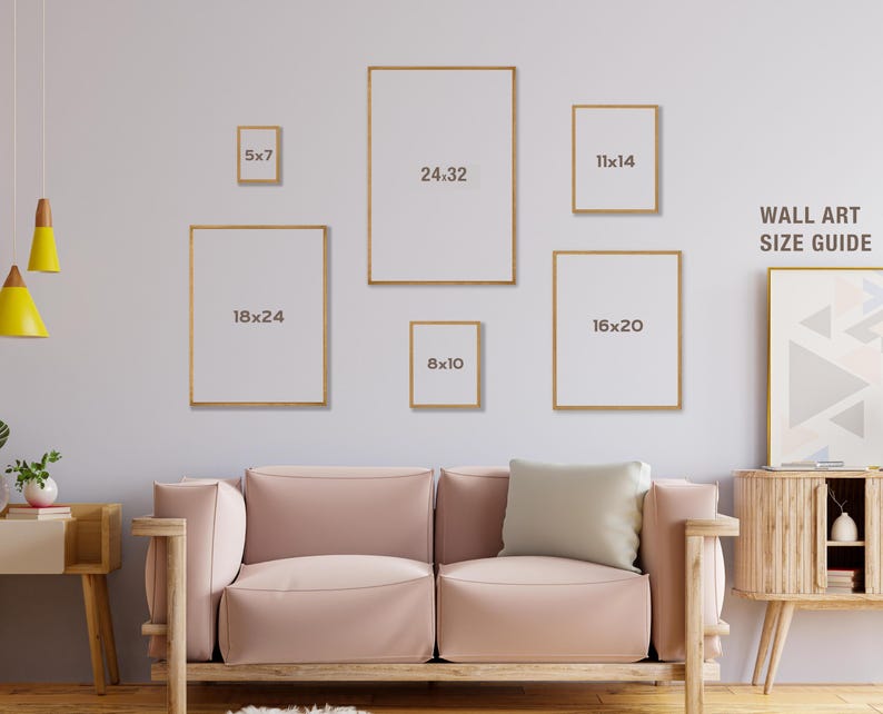 May include: A wall art size guide displays framed art in various sizes: 5x7, 8x10, 11x14, 16x20, 18x24, and 24x32 inches. The frames have a gold finish. The text "WALL ART SIZE GUIDE" is visible on the right side of the image.