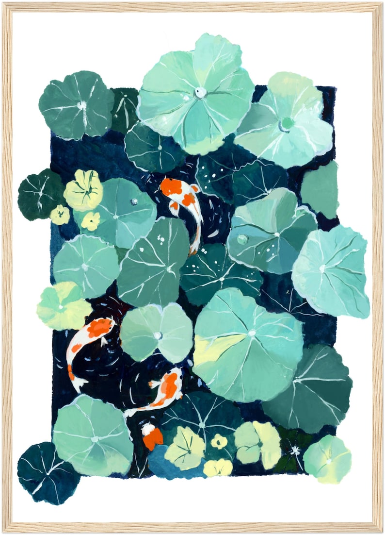 May include: A framed art print featuring a pond scene with koi fish and lily pads. The artwork showcases a dark blue pond with green lily pads and orange and white koi fish. The frame is made of light-colored wood.