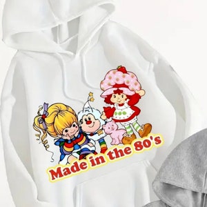 ¡Libera a tu niño interior con nuestra sudadera con capucha de dibujos animados de los 80!
