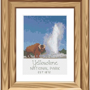 May include: A cross-stitch design featuring a brown bison standing near a geyser erupting in Yellowstone National Park. The text "Yellowstone National Park Est 1872" is below the image.