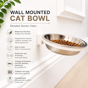 May include: A wall mounted cat bowl featuring a silver stainless steel basin held by a white bracket. The text reads WALL MOUNTED CAT BOWL, Elevated. Secure. Clean., and lists features including PLA Plus material, 304 stainless steel, and hardware.