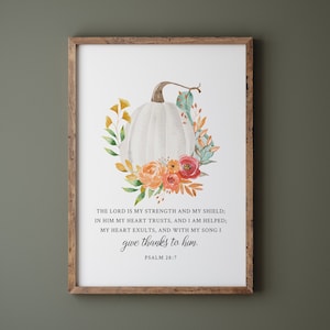 May include: A watercolor painting of a white pumpkin with orange and pink flowers. The text reads "THE LORD IS MY STRENGTH AND MY SHIELD; IN HIM MY HEART TRUSTS, AND I AM HELPED; MY HEART EXULTS, AND WITH MY SONG I give thanks to him. PSALM 28:7"