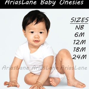 May include: A baby wearing a white onesie is sitting on a light blue surface. The baby is looking at the camera. The text "SIZES" is written in black above the text "NB, 6M, 12M, 18M, 24M" written in black.