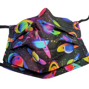 May include: A black face mask with a colorful galaxy print featuring planets and stars. The planets are in shades of pink, blue, green, and yellow.