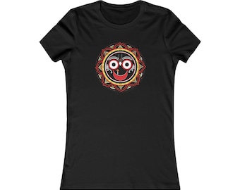 May include: Black women's t-shirt featuring a red, yellow and black mandala design with a smiling face and large eyes.
