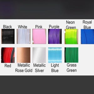 May include: A range of 3D printer filament spools in colours such as black, white, pink, purple, neon green, and royal blue. Other colours include red, metallic rose gold, metallic silver, light blue, and grass green.