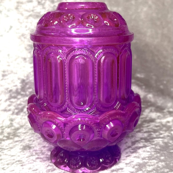 A two-piece resin fairy lamp with hand-embedded violet orchids, moon, and stars — glows like something out of a Victorian greenhouse fantasy.