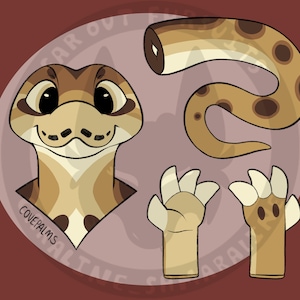 以下が含まれることがあります： 笑顔の顔、セグメント化された尾、2組の足を持つ漫画の爬虫類のイラスト。 爬虫類は主にタンと茶色で、濃い茶色の斑点とアクセントがあります。 テキスト「COVEPALMS」が表示されます。