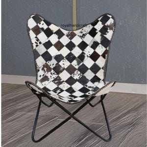 Patchwork Leather Butterfly Chair: Black and White Cowhide, Iron Stand