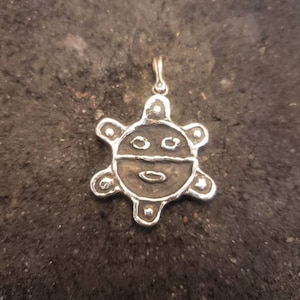 Taino sun pendant
