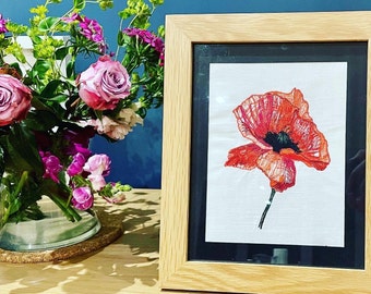 Poppy embroidered artwork picture with black mount