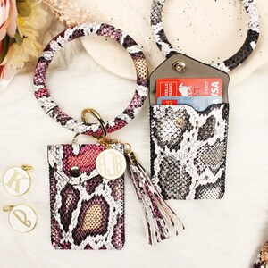 Mini llavero de bolsa. Brazalete Llavero con Estuche. Llavero monedero con muñequera. Llavero con tarjetero personalizado. Llavero tipo billetera de piel de serpiente