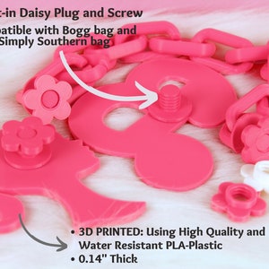 May include: Pink 3D printed daisy plug and screw with a built-in screw. The plug is compatible with Bogg and Simply Southern bags. The plug is 0.14 inches thick and made of water-resistant PLA plastic.