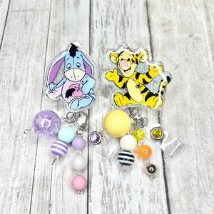 Winnie the Pooh badge reel, baby Eeyore and baby Tigger badge reel, nurse badge reel, medical assistant badge reel, ID holder, badge holder