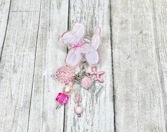 Porta credencial para perro con globo Coquette: Porta credencial con lazo rosa