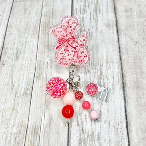 Coquette Cherry Balloon Dog Badge Reel: Pink Bow ID Holder