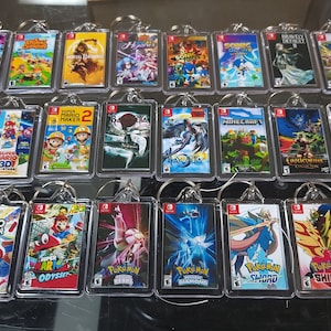 Nintendo Switch Game Art Videospiel Schlüsselanhänger | Kette | Aufhänger | Anhänger (2-seitig vorne und hinten) Rucksack Reisetasche Geldbörse Lanyard Schlüsselring