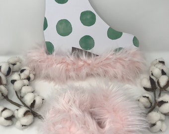 Fuzzy soakers for ice skates, faux fur ice skate soakers, pink soakers, ice skate blade covers, hockey skate blade covers
