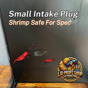 May include: A black intake plug for an aquarium, labelled "Small Intake Plug Shrimp Safe For Spec". The plug is shown with a red shrimp sticker and a betta fish sticker with the text "LID-PROPZ SHOP 3-D PRINTING".