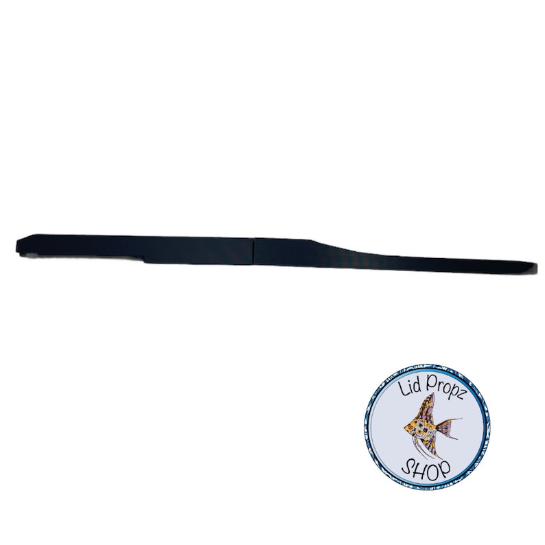 May include: A black plastic lid for a fish tank or aquarium. The lid is long and thin, with a slight curve to it.