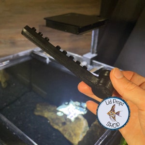 Two spray bars side by side: Regular Flow and Low Flow models. Designed for Fluval tanks to eliminate dead zones and reduce harsh currents without lowering filtration power.