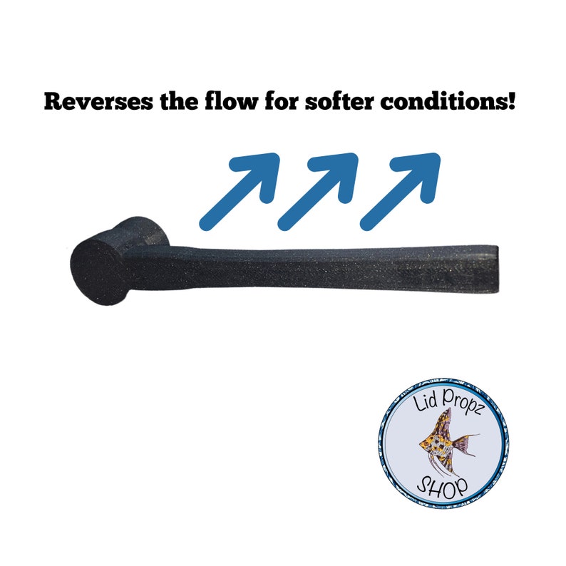 May include: A black, textured, cylindrical object with a handle, designed to reverse flow. The text reads "Reverses the flow for softer conditions!" and includes a logo with a fish and the words "Lid Propz SHOP".