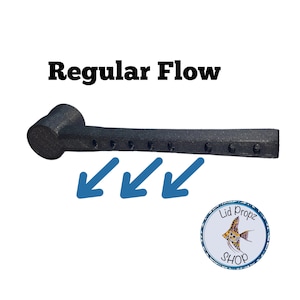 May include: A black, elongated device with a cylindrical head and holes along its length. The text "Regular Flow" is above the object, with blue arrows pointing down. A circular logo with a fish and the text "Lid Propz SHOP" is in the bottom right.
