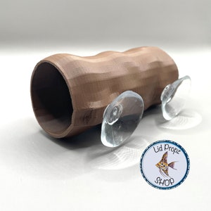 Pamper your betta with our Betta Log featuring soft edges designed for delicate fins.