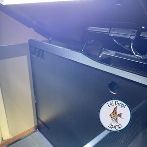 Close-up of rear chamber guard with lid props and intake covers in place. Provides full protection against fish escaping into the rear filter compartment.