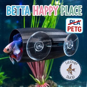 May include: A black cylindrical fish tunnel with two clear suction cups attached to the side. A blue and red betta fish is inside the tunnel. Text reads BETTA HAPPY PLACE and PLA PETG. A circular logo for Lid Propz Shop is in the corner.