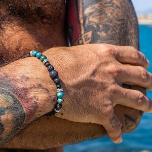 Healing armband lavasteen voor heren - heren armband met turkoois edelsteen kralen - beschermende armband zwarte lavasteen - oceaanjaspis armband