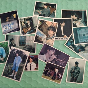 May include: A collection of rectangular photo cards featuring images of a male musician. The cards display the word "SONG" and the word "Finale". The photos show the musician playing instruments and posing.