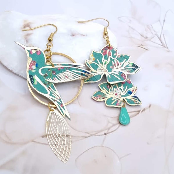 Mismatched asymmetrical earrings: large hummingbird and magnolias in Liberty FABRIC Donna Leigh jade and gold stainless steel