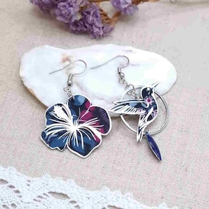Mismatched asymmetrical hummingbird and hibiscus earrings in purple Persephone liberty fabric and silver stainless steel