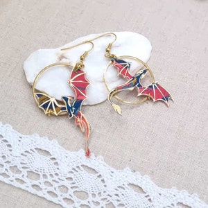 mismatched asymmetrical Dragons earrings in Little Eustacia Liberty fabric and gold-plated stainless steel
