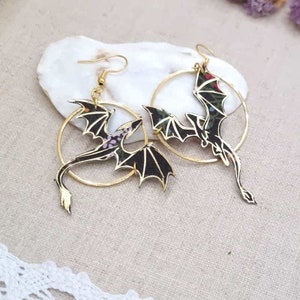 mismatched asymmetrical Dragons earrings in black Erica liberty fabric and gold stainless steel