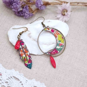 Moon earrings and asymmetrical mismatched feather in liberty of london fabric margaret annie fushia and bronze brass