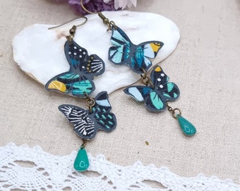 Mismatched asymmetrical butterfly earrings in emerald Nagoya cotton fabric and bronze brass