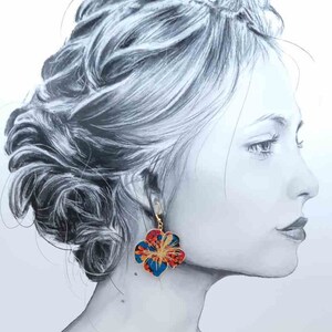 mismatched asymmetrical large hummingbird and large hibiscus earrings in oil Ciara liberty FABRIC and golden stainless steel image 3