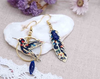 Asymmetrical mismatched hummingbird bird and feather earrings in donna leigh midnight liberty fabric and stainless steel