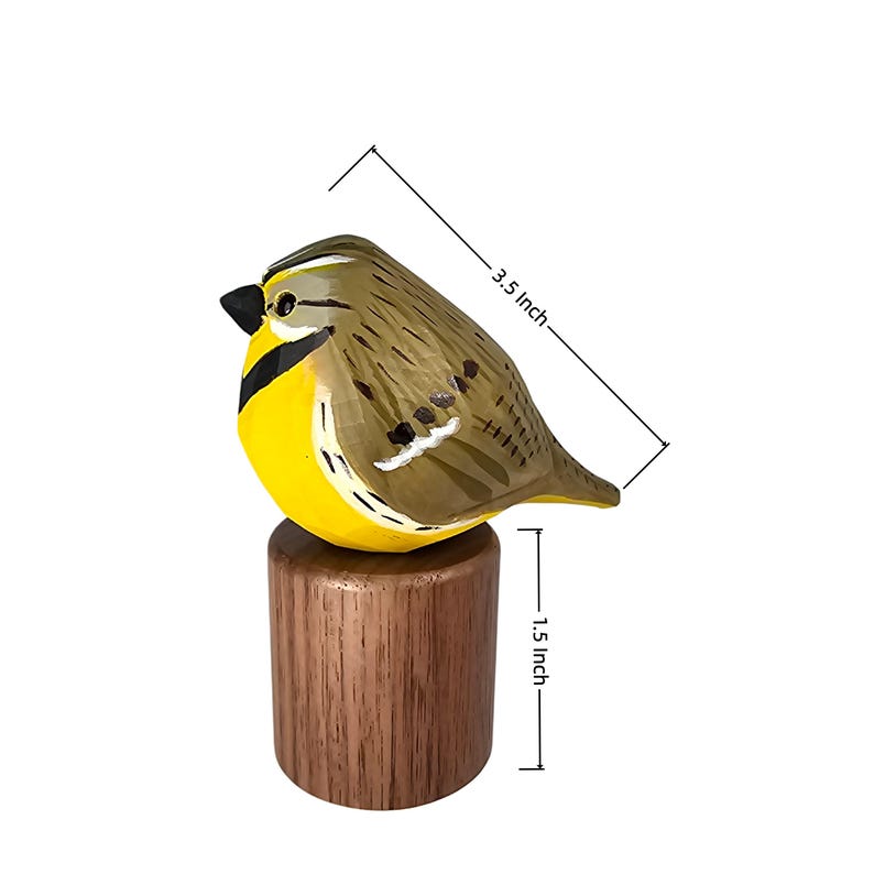 Sizing diagram for a hand-carved wooden Western Meadowlark figurine. The 3.5-inch bird features a faceted whittled texture and yellow plumage, perched on a 1.5-inch cylindrical wood base. Perfect for rustic home decor, a nature-themed shelf sitter, or a unique gift for bird watchers.