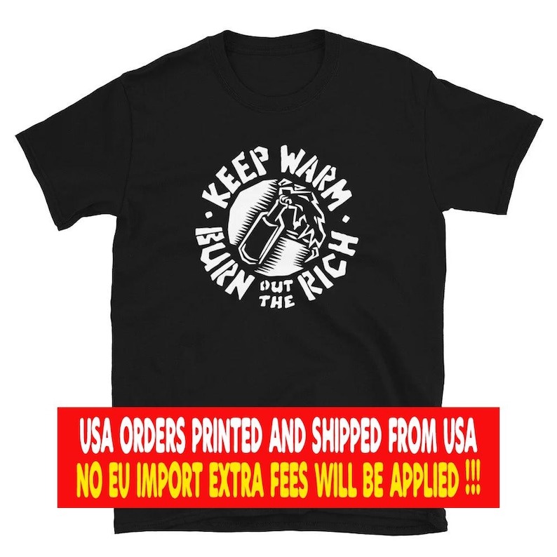 May include: A black short-sleeved t-shirt featuring a white circular graphic on the chest. The design depicts a bottle with flames and the text "KEEP WARM BURN THE RICH" arranged in a circle around the central illustration of the bottle.