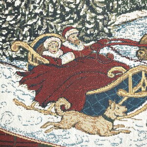 May include: A tapestry featuring a red sleigh pulled by two dogs, with a man and woman riding in the sleigh. The sleigh is decorated with gold trim and the dogs are brown and white. The background is a snowy forest scene.