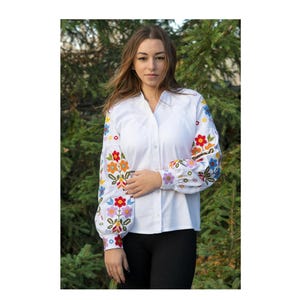 Linen women&#39;s white blouse with luxurious designer floral embroidery. Stylish embroidered clothing. Vyshchyvanka + surprise gift