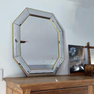 Octagonal brass-plated mirror with glazing beads 78 x 66 cm by Jan Deknudt