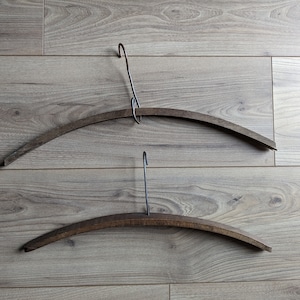 Pair of handcrafted vintage hangers