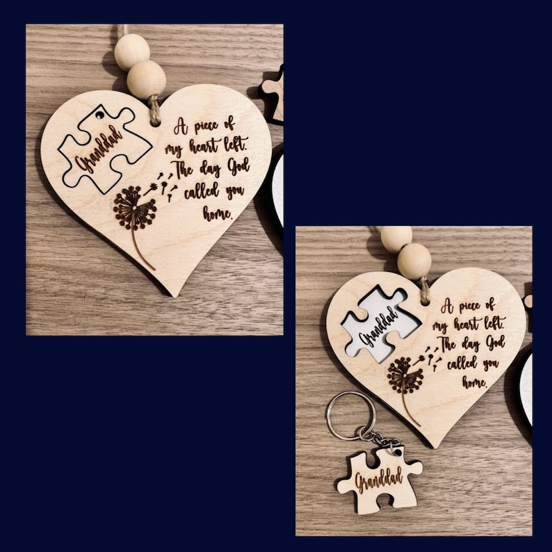 May include: A wooden heart-shaped ornament with a puzzle piece cutout that says "Granddad". The ornament has a dandelion design and the text "A piece of my heart left. The day God called you home."