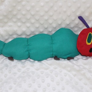 Plush The caterpillar that makes holes in fabric